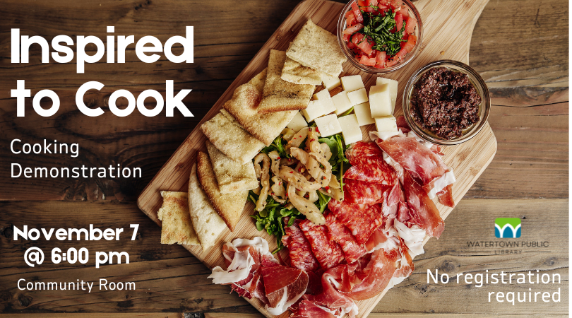 Charcuterie board and wooden background.